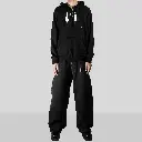 KOUPE TET ZIPUP HOODIE BLACK FRONT model images.webp